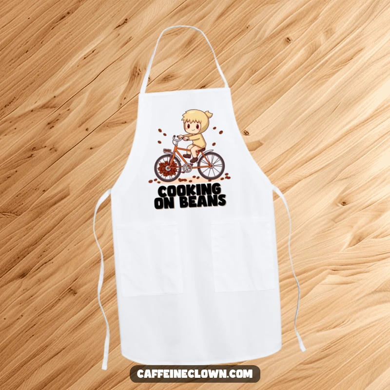 Funny whimsical character attempting to pedal a bicycle powered by coffee beans, on a practical and stylish kitchen apron.