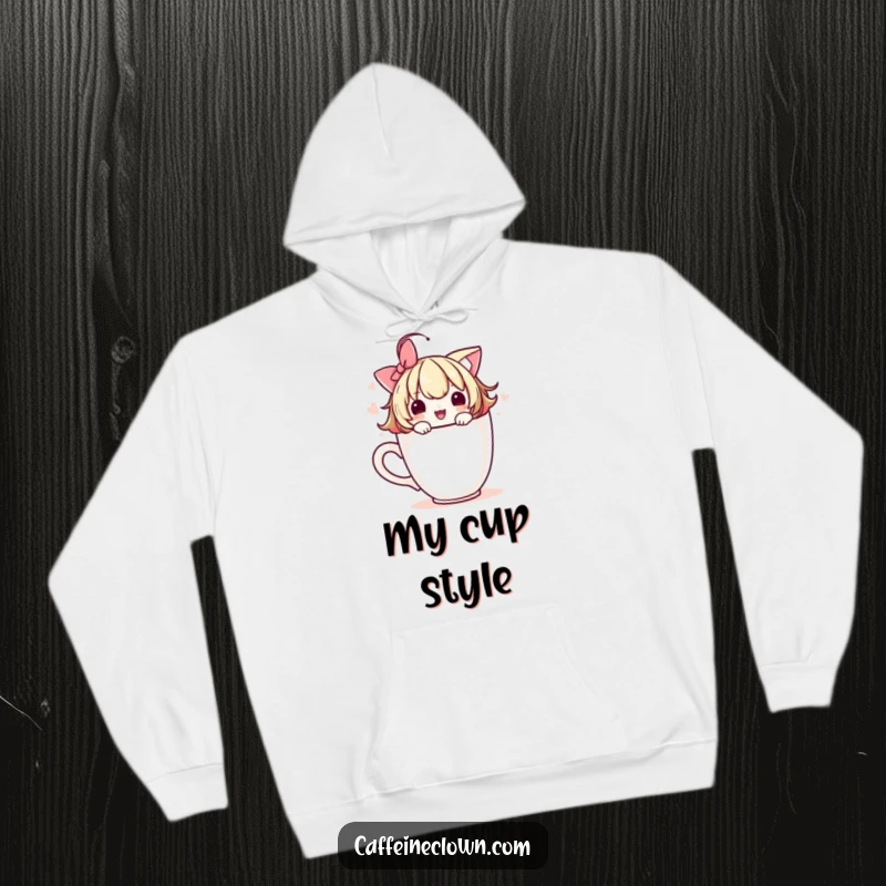 Funny hoodie with a cute character adorning a coffee cup with a playful flourish, perfect for staying warm and stylish.