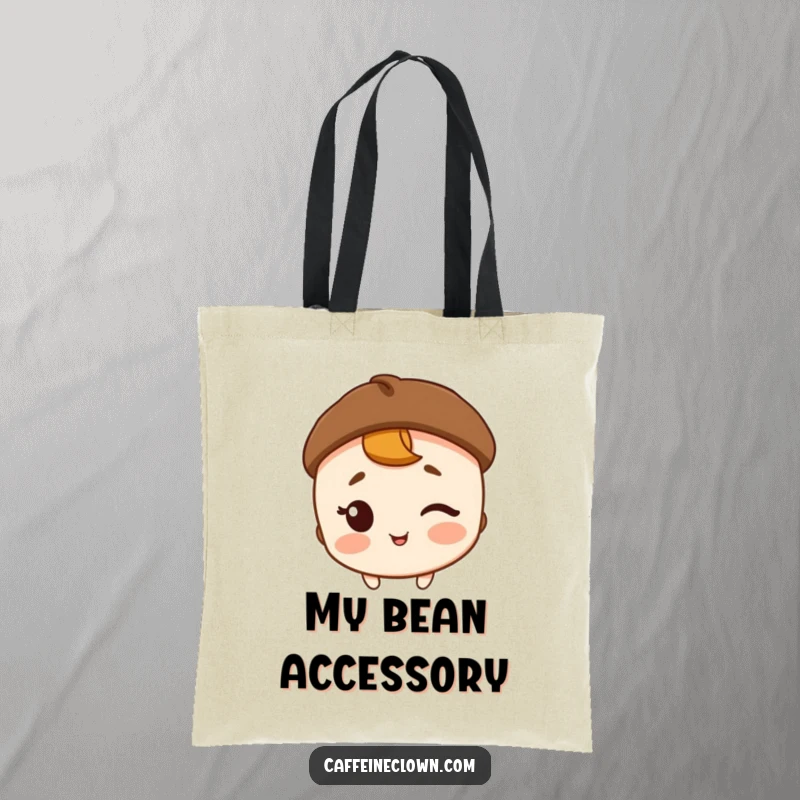 Funny tote bag featuring a winking character in a coffee bean hat, great for carrying coffee essentials humorously.